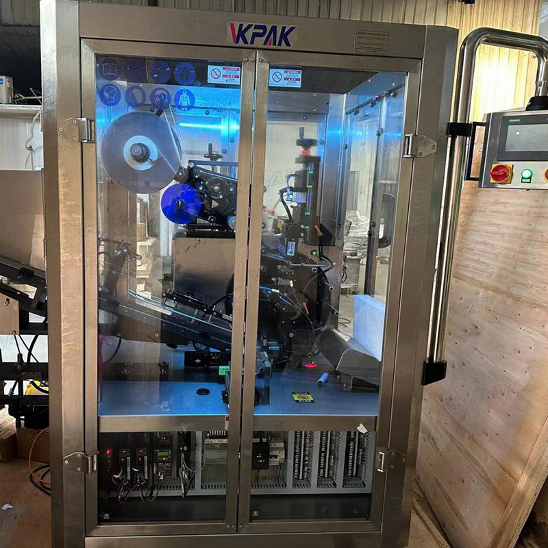 Étiqueteuse automatique de tubes souples en plastique avec système d'alimentation de tubes