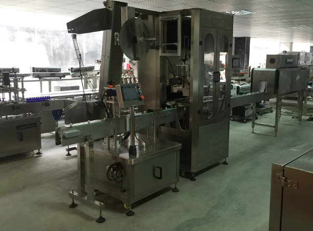 étiqueteuse de manchons de ruban adhésif.jpg