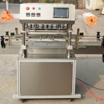 Machine automatique de scellage de film pour bocaux de snacks à trois têtes