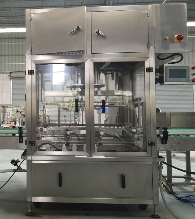 Linear filling machine with 4 filling heads MACHINE DE REMPLISSAGE LINEAIRE.jpg