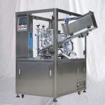 Machine de remplissage et de scellage de tubes à double chambre pour lotions et crèmes cosmétiques