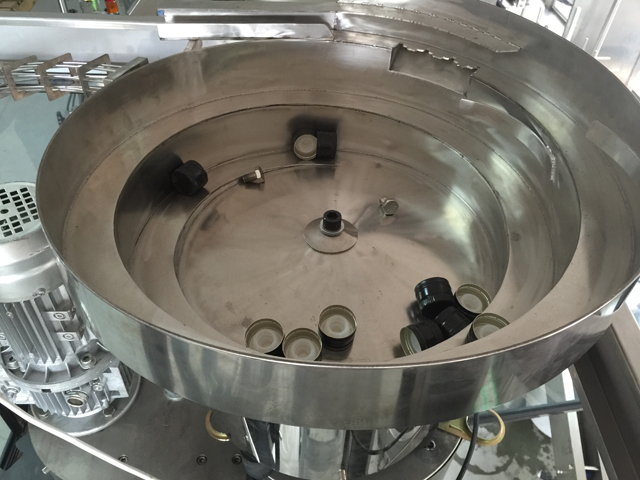 système d'alimentation par vibrateur de capsules.jpg