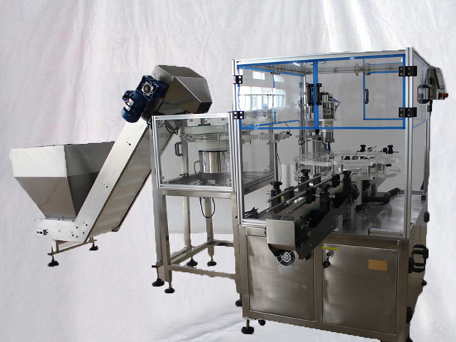machine de bouchage de bouteilles avec système de chargement de bouchons VKPAK