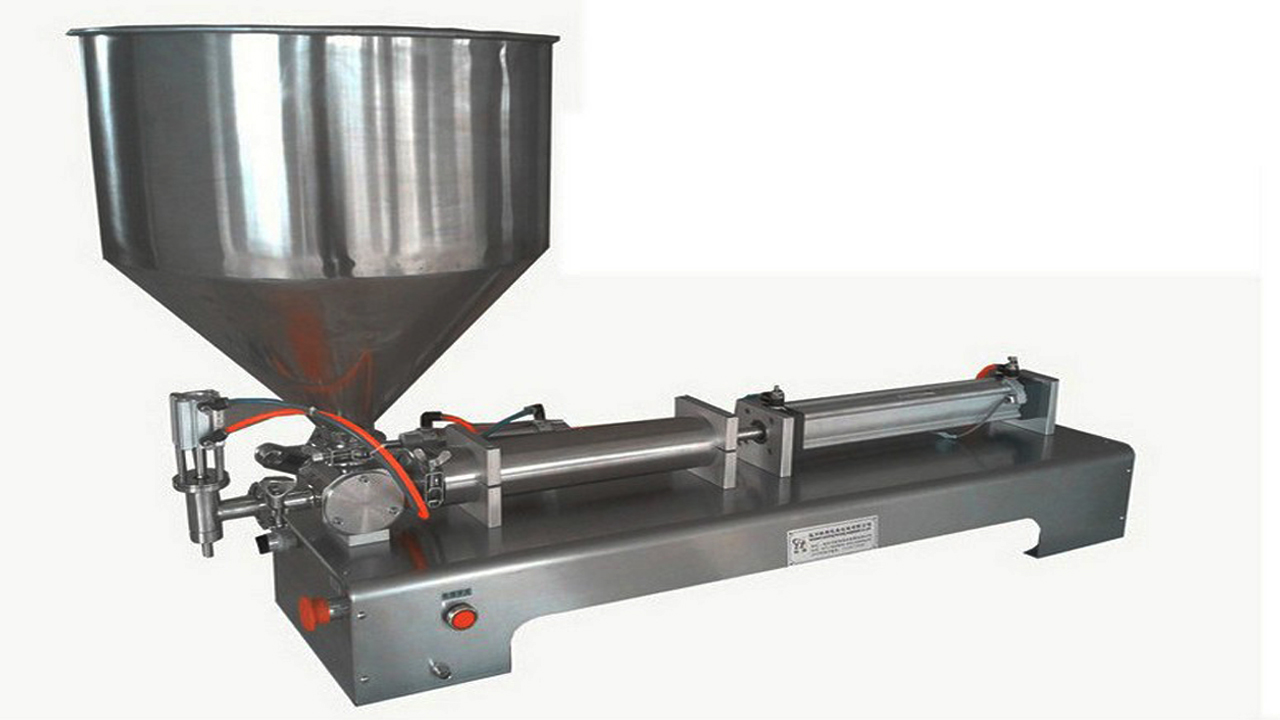 liquid filler semi automatic trémie verticale pour machine de remplissage horizontale.jpg